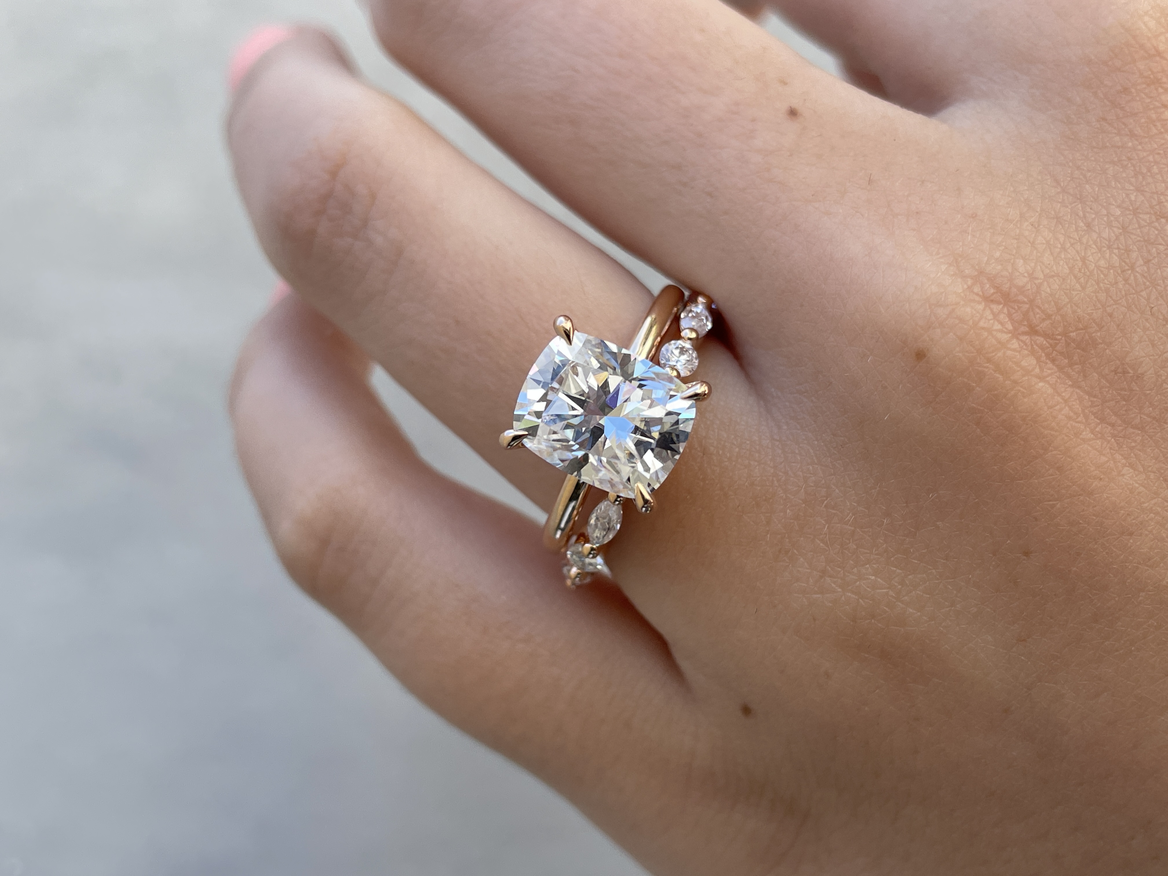 Odette - Round and Marquise Accent Stones Wedding Ring Lifestyle Image