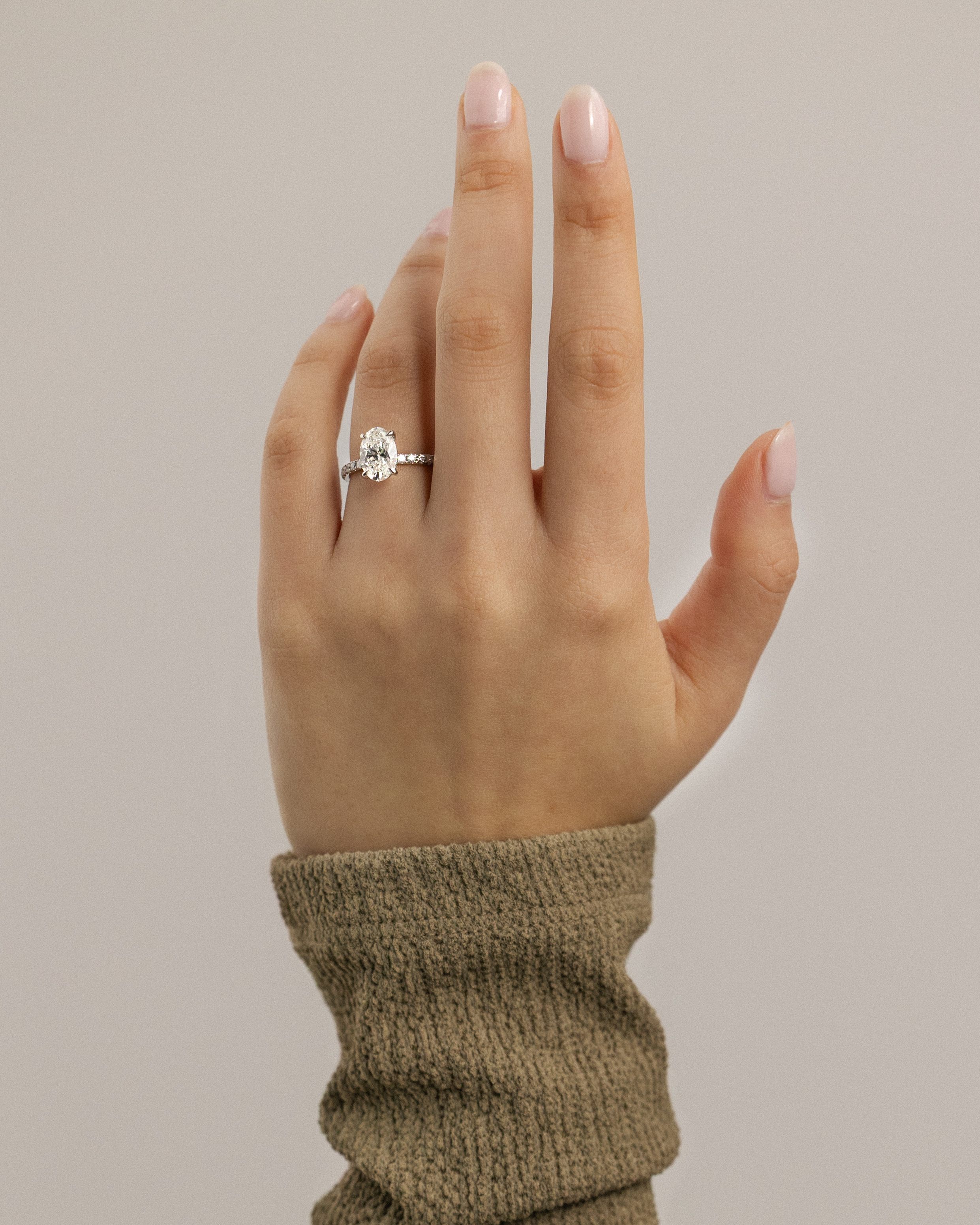 Paige  Oval Solitaire with Hidden Halo and Pave Lifestyle Image