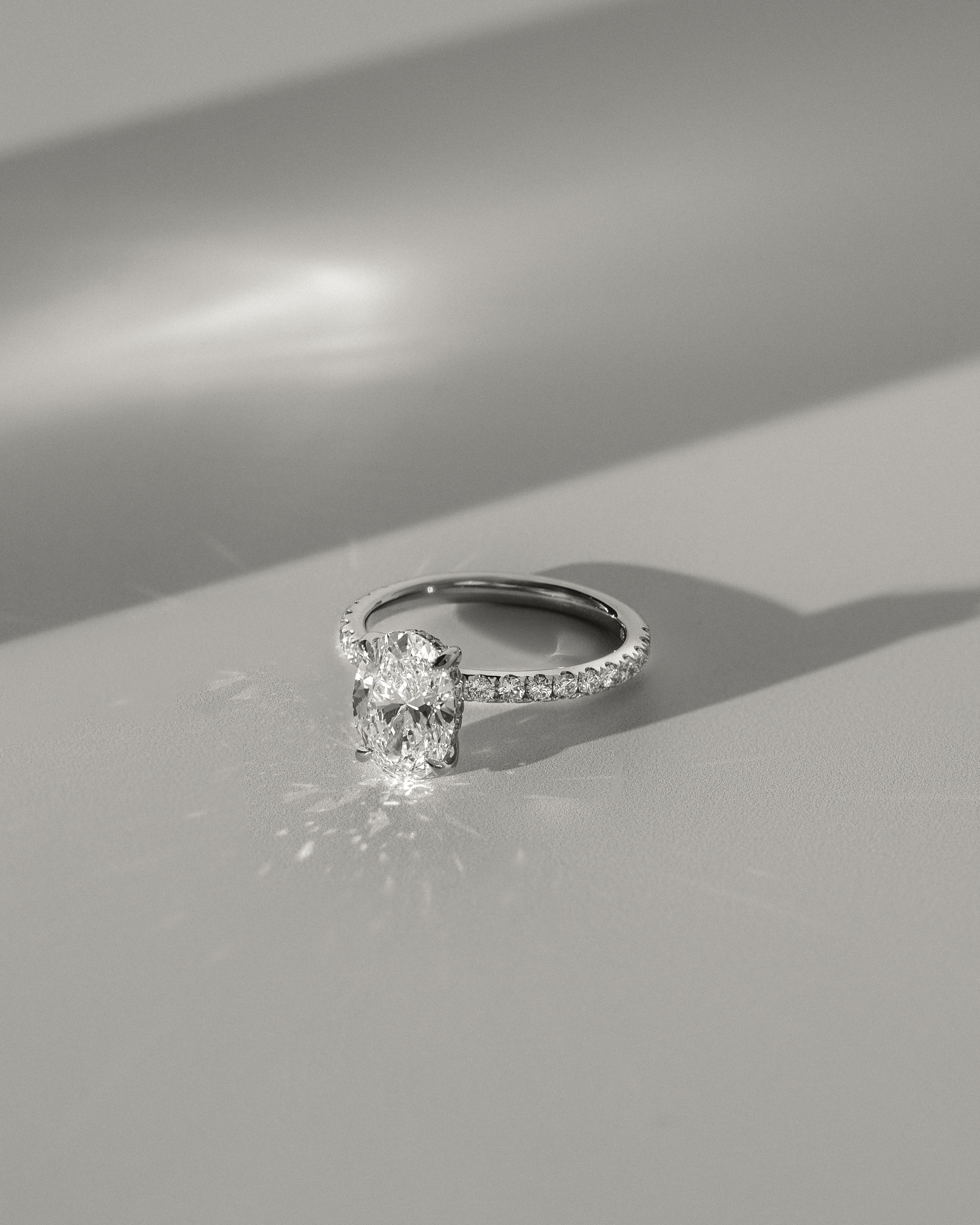 Paige  Oval Solitaire with Hidden Halo and Pave Lifestyle Image