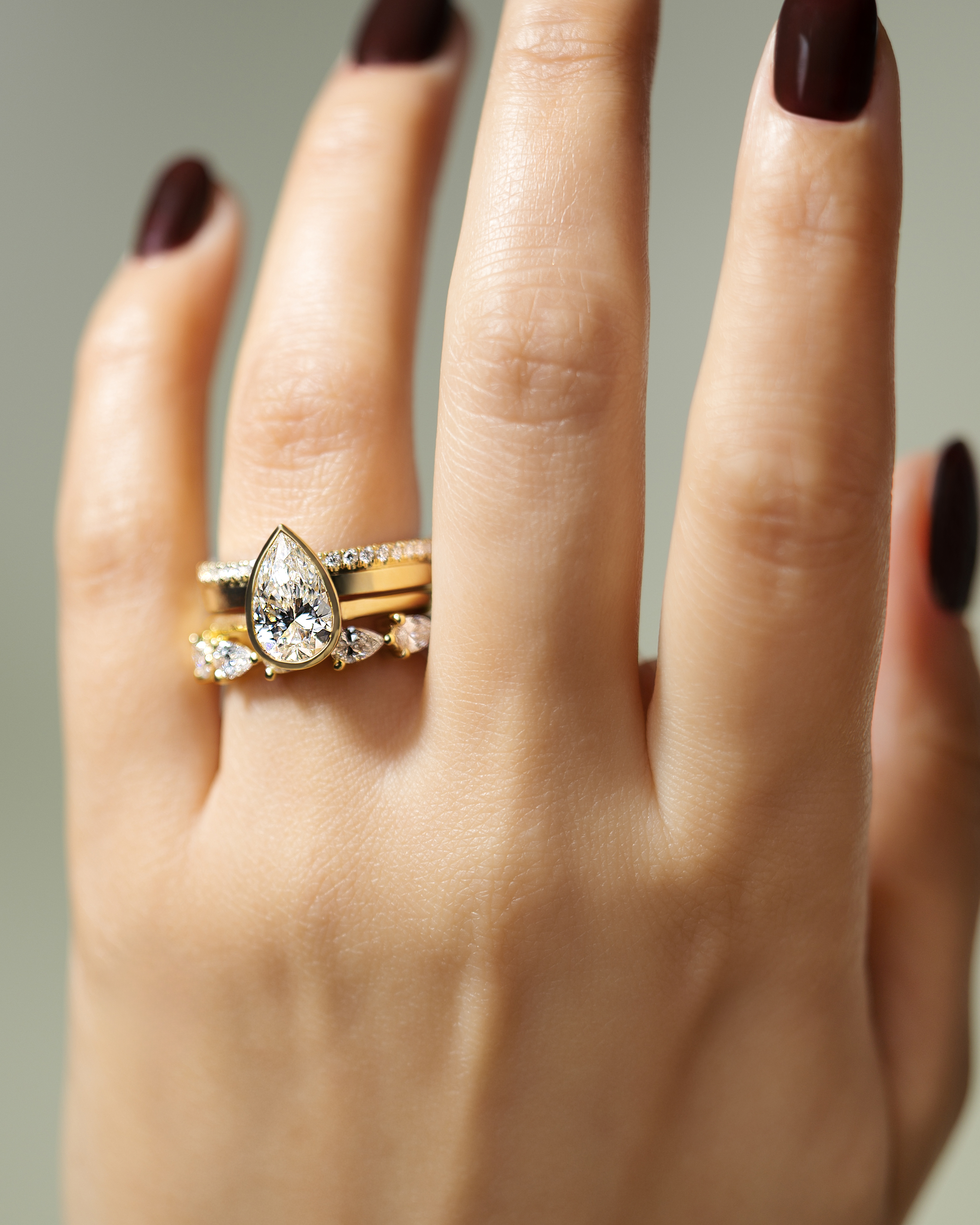 Paris - Pear Solitaire with Cathedral Bezel Setting Lifestyle Image