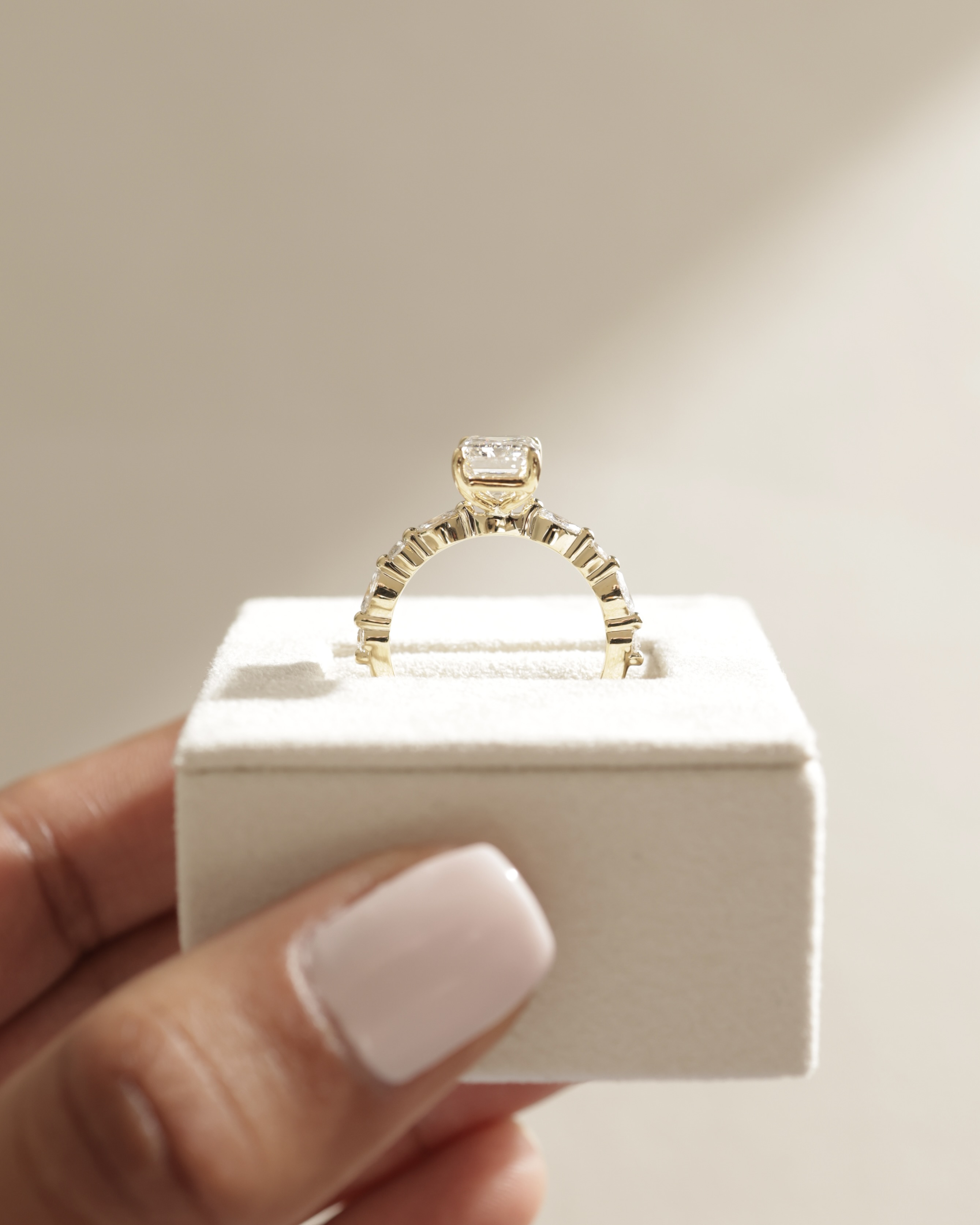 Parker - Emerald Solitaire with Accent Band Lifestyle Image