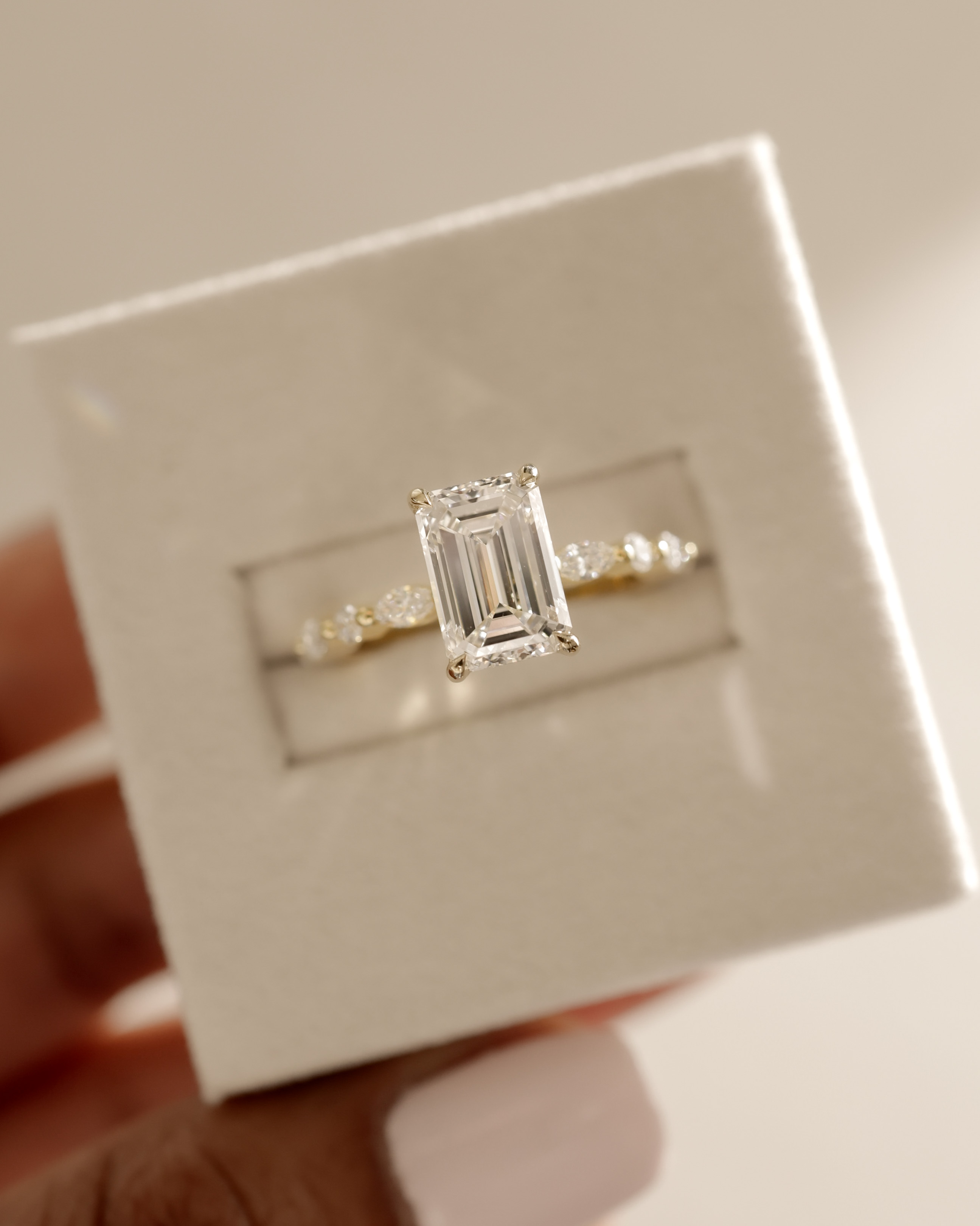 Parker - Emerald Solitaire with Accent Band Lifestyle Image