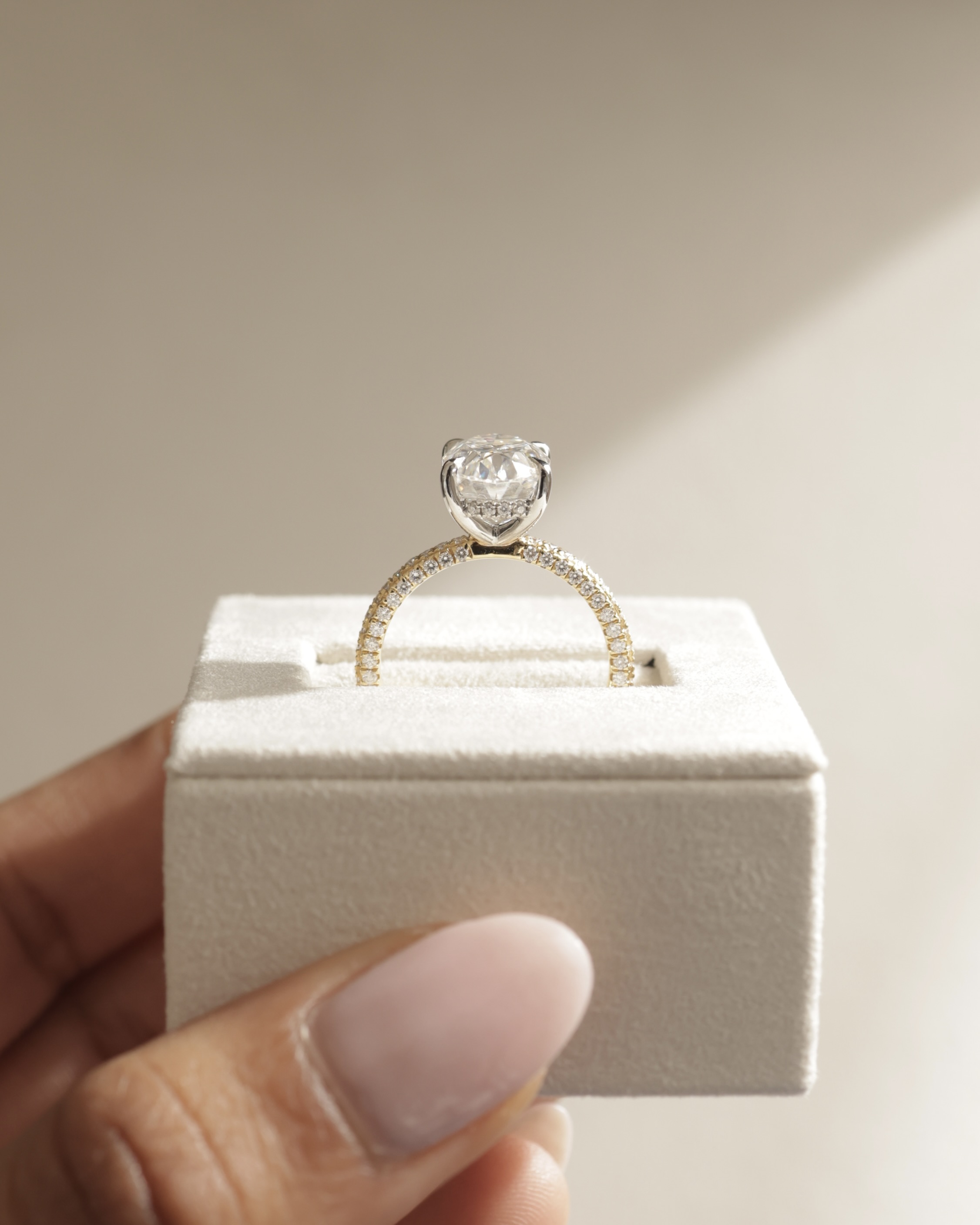 Penelope   Oval Solitaire with Hidden Halo and Triple Pav Lifestyle Image