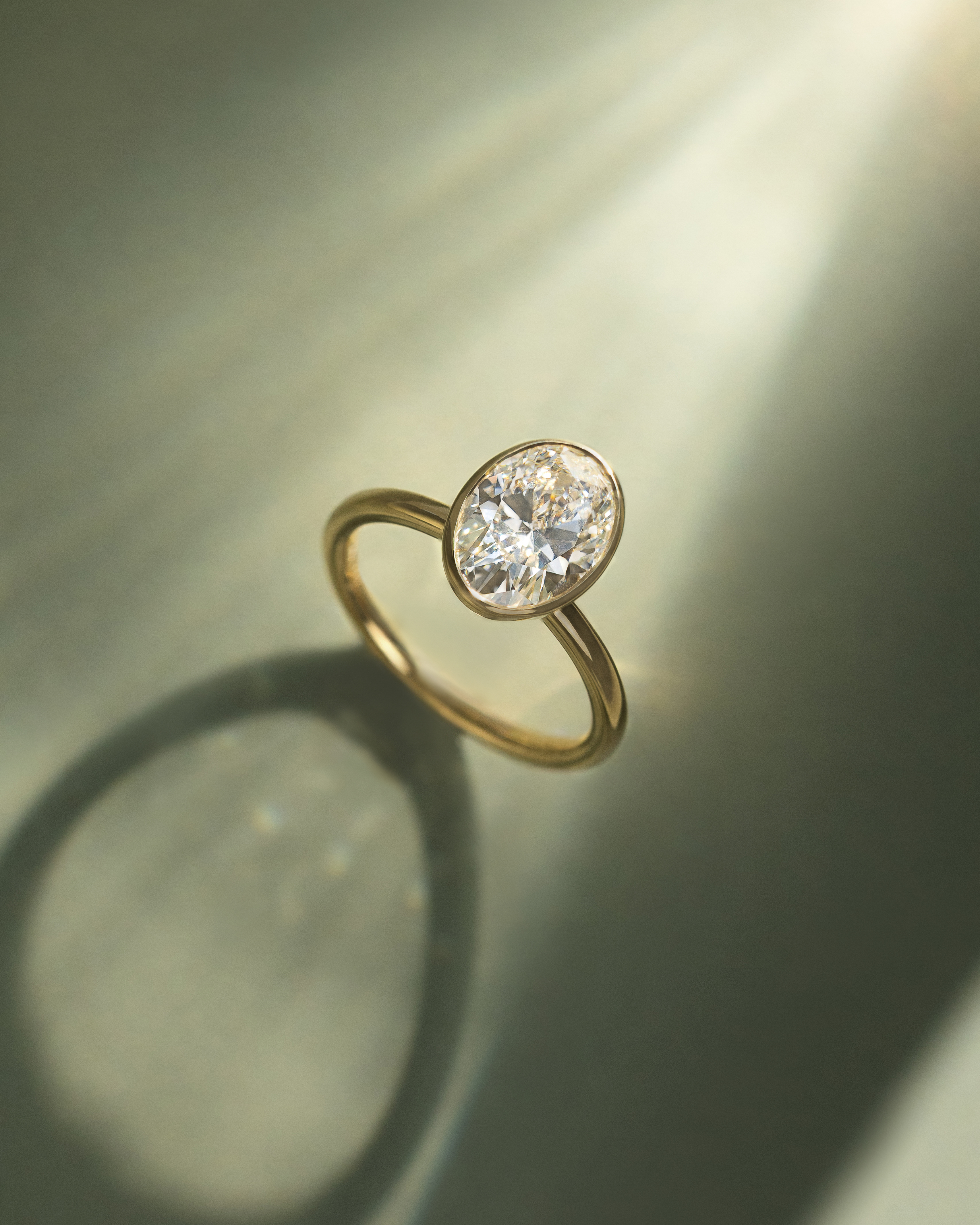 Sage - Bezel Set Oval Solitaire Lifestyle Image