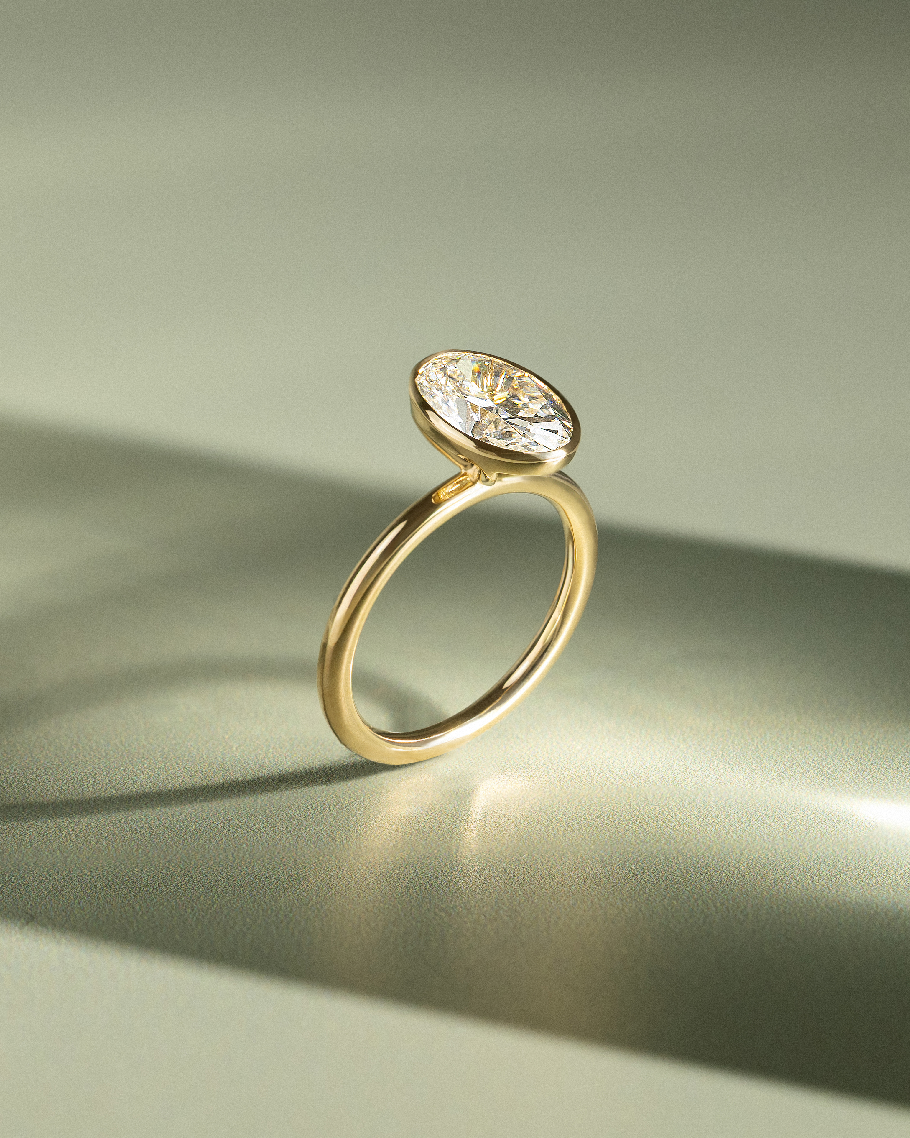 Sage - Bezel Set Oval Solitaire Lifestyle Image