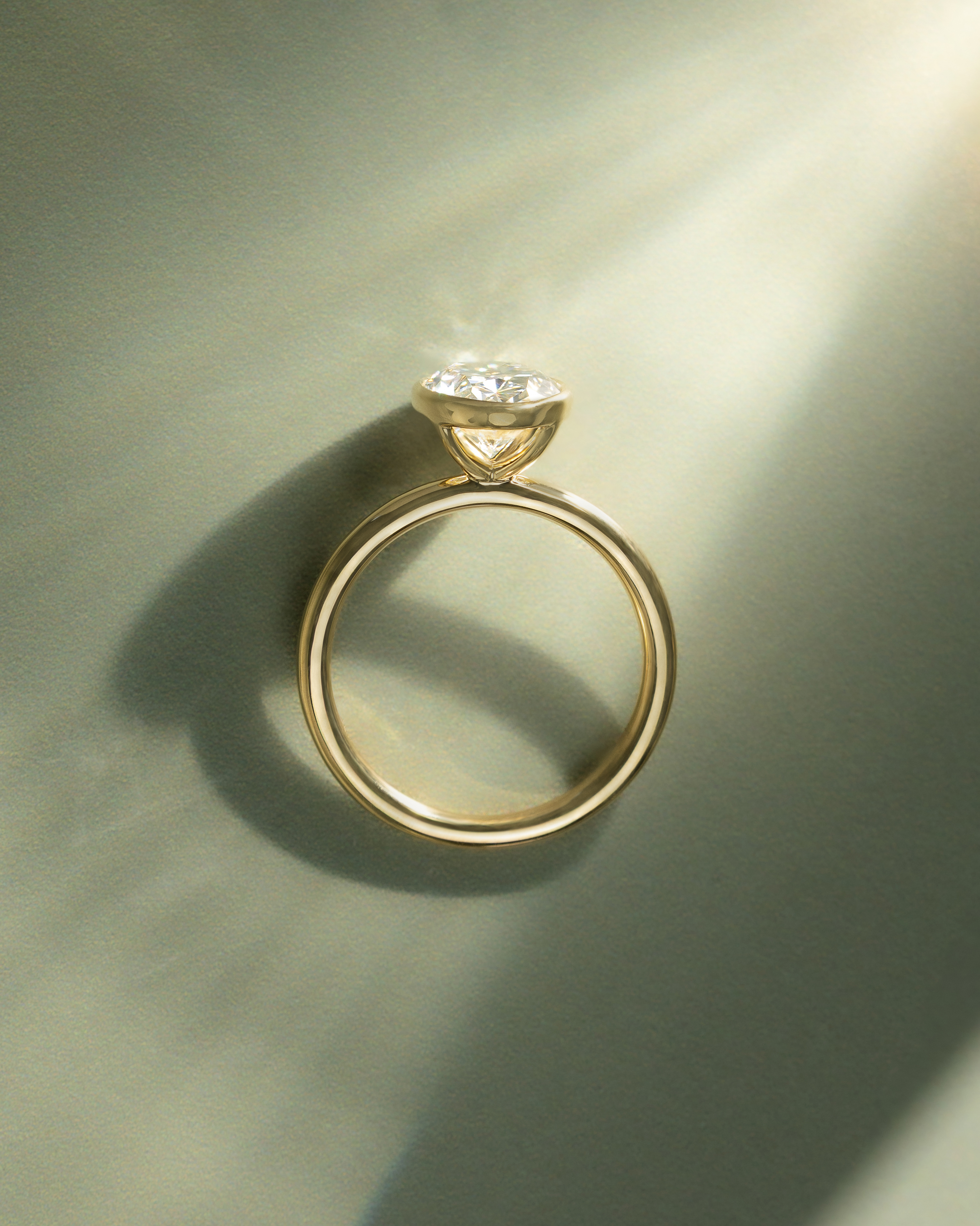 Sage - Bezel Set Oval Solitaire Lifestyle Image