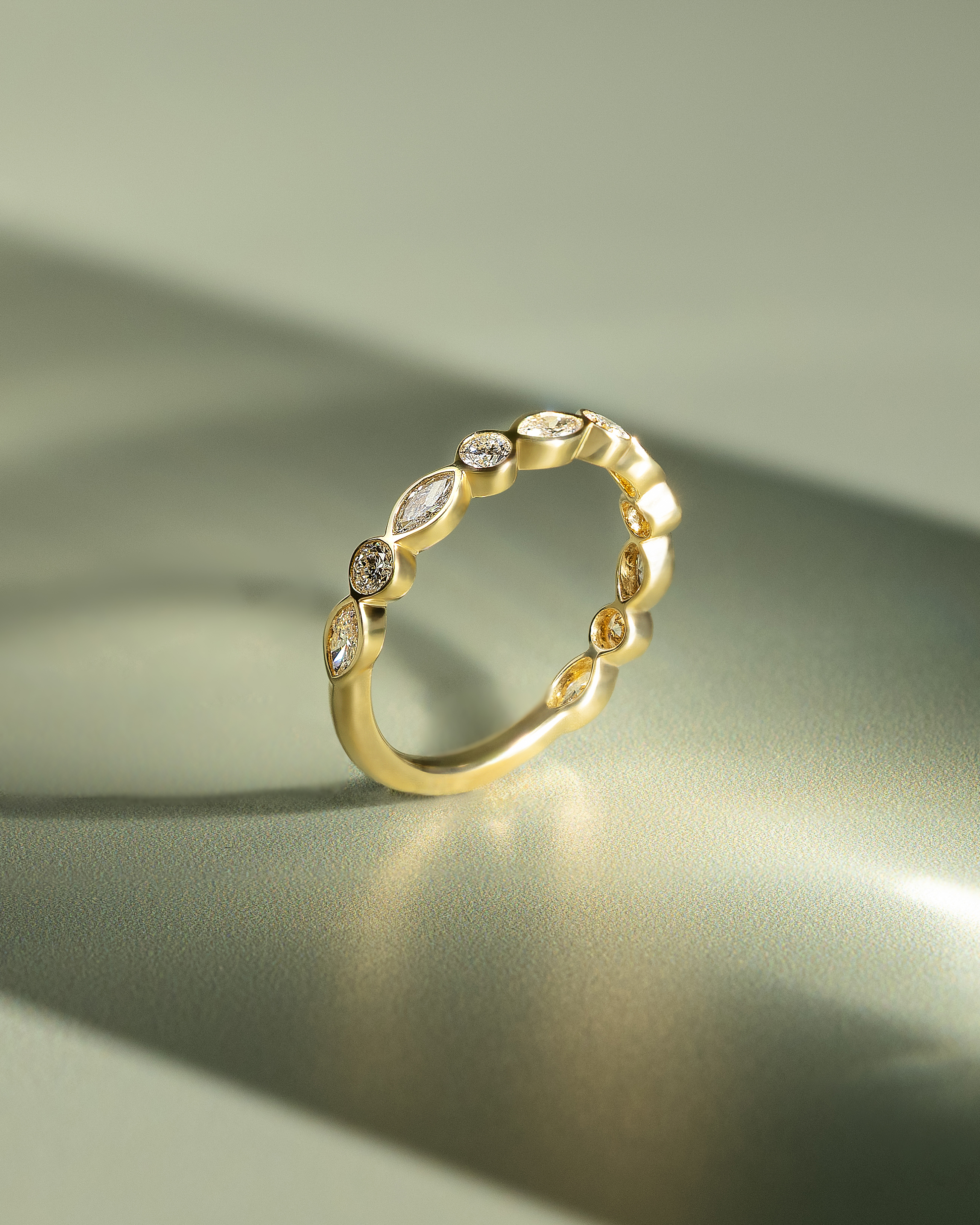 Sarah - Bezel Set Round and Marquise Accent Stones Wedding Ring Lifestyle Image