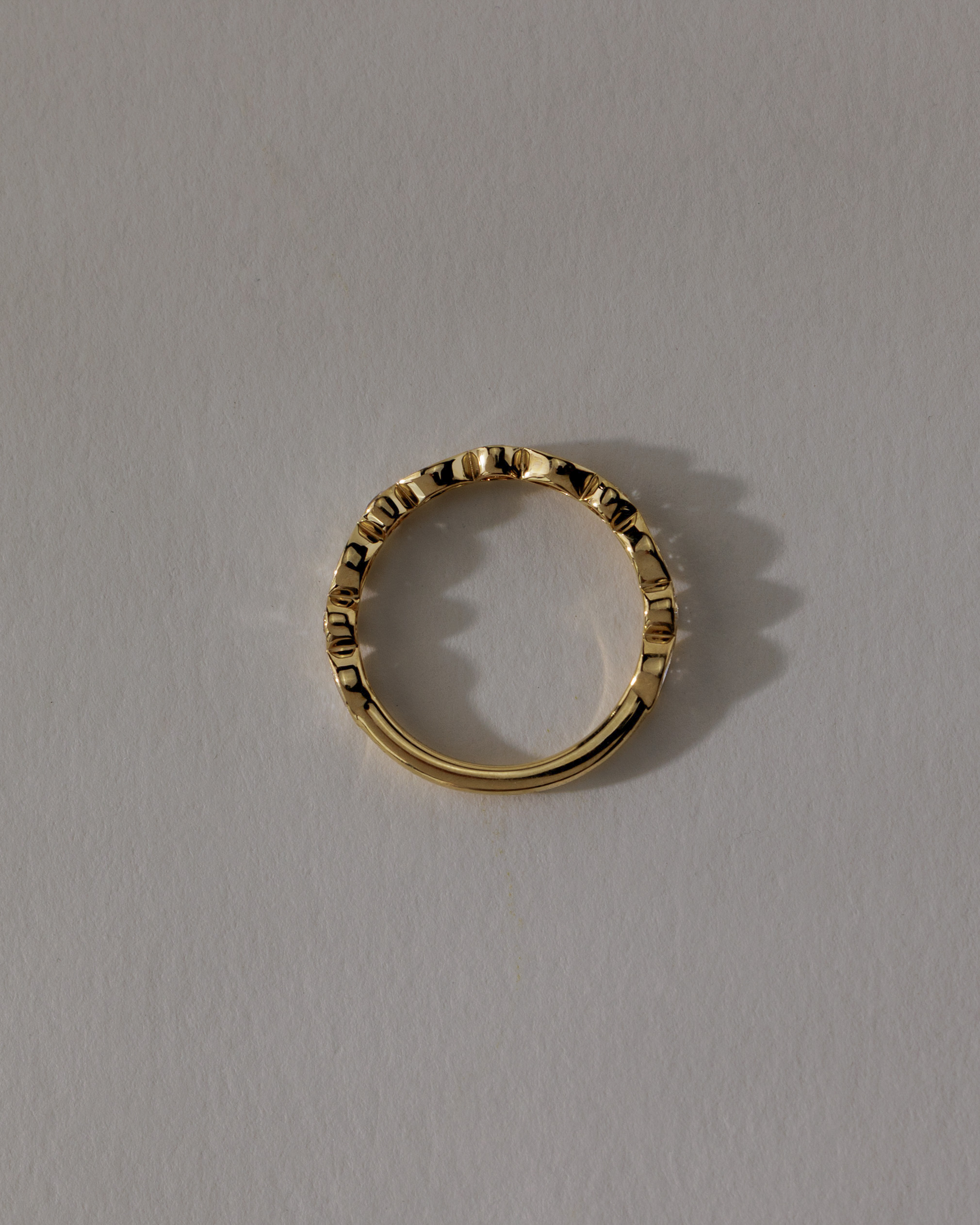 Sarah - Bezel Set Round and Marquise Accent Stones Wedding Ring Lifestyle Image