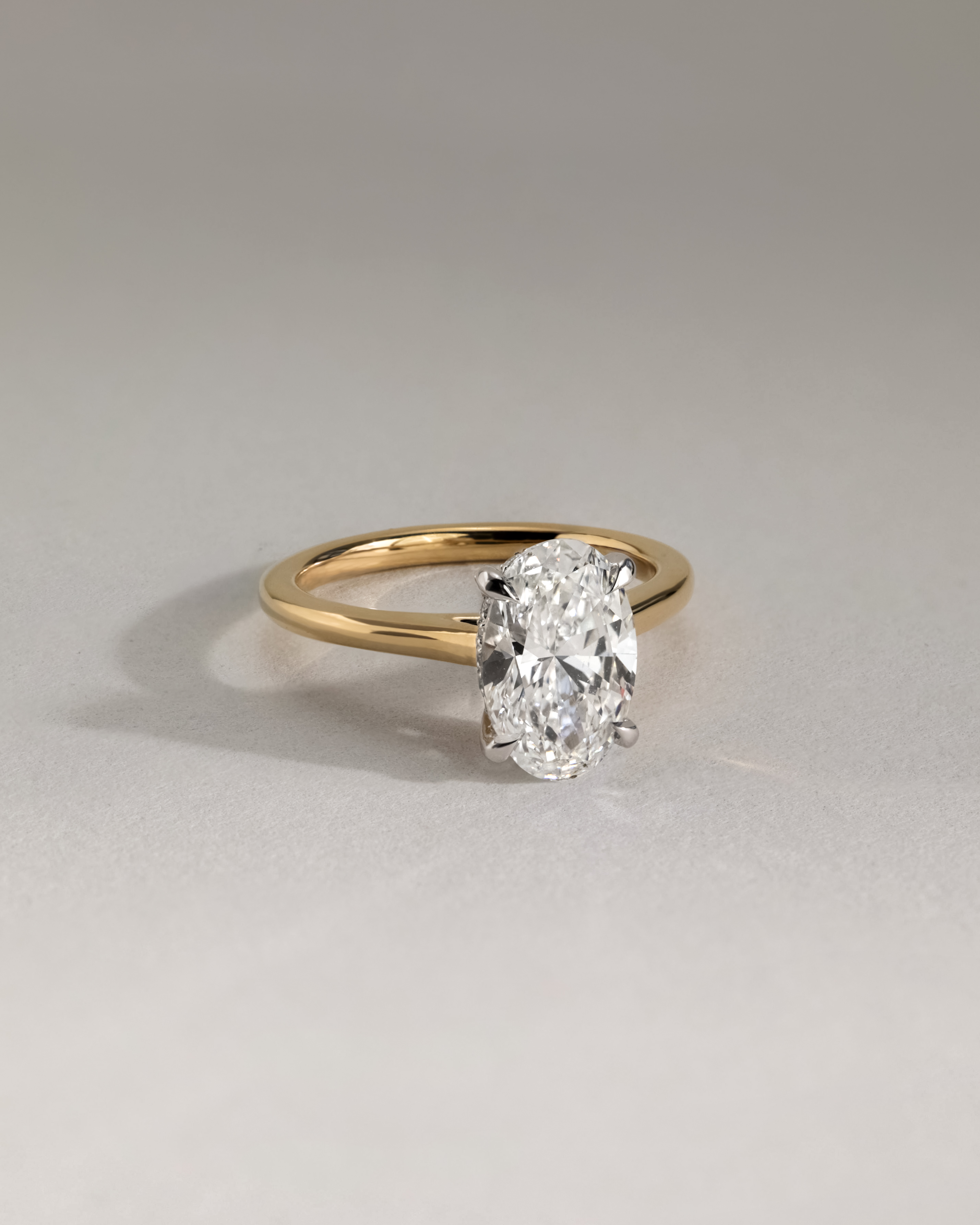 Scarlett - Oval Cathedral Solitaire with Hidden Halo Lifestyle Image