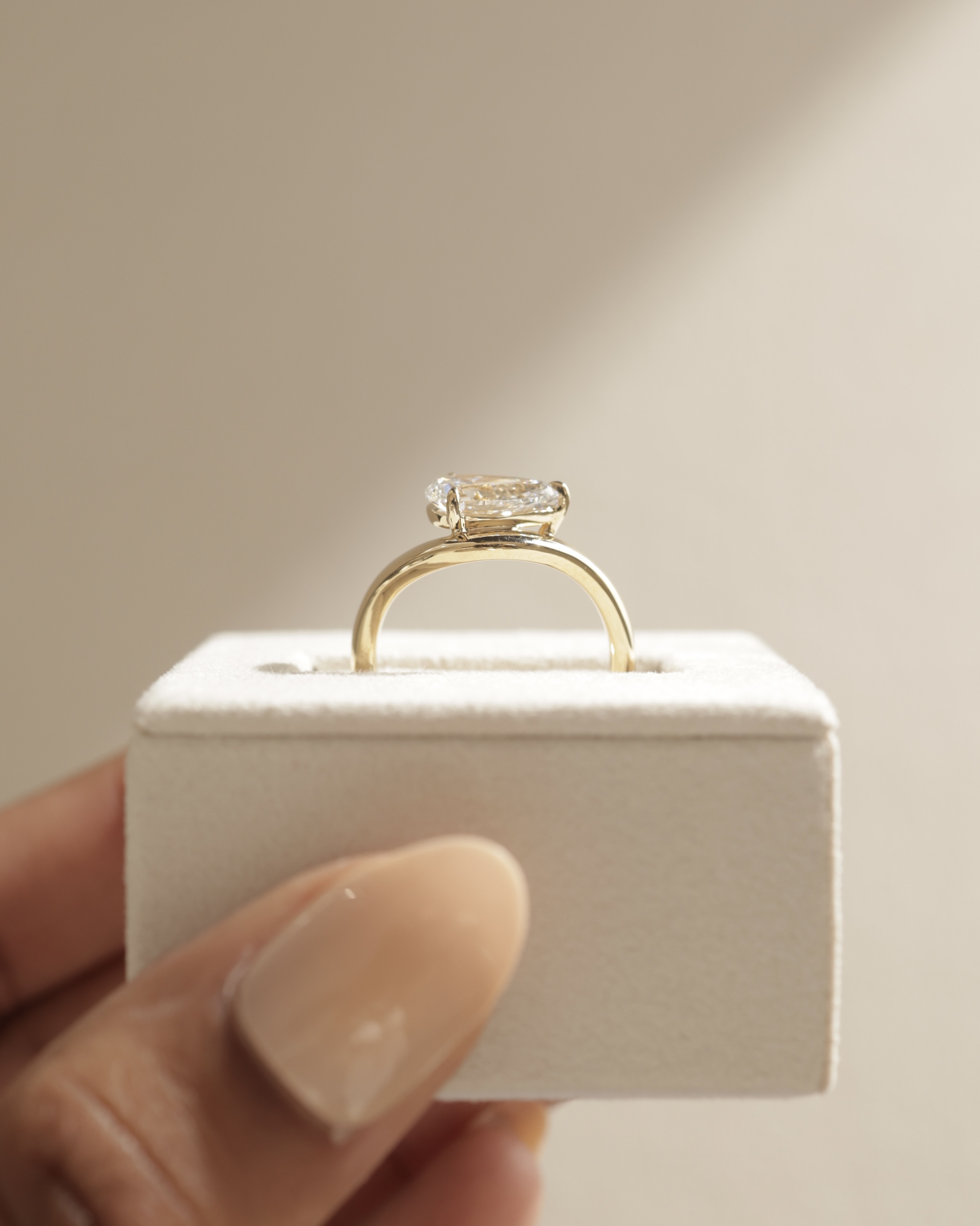 Shai - Pear Solitaire with Twist Band Lifestyle Image
