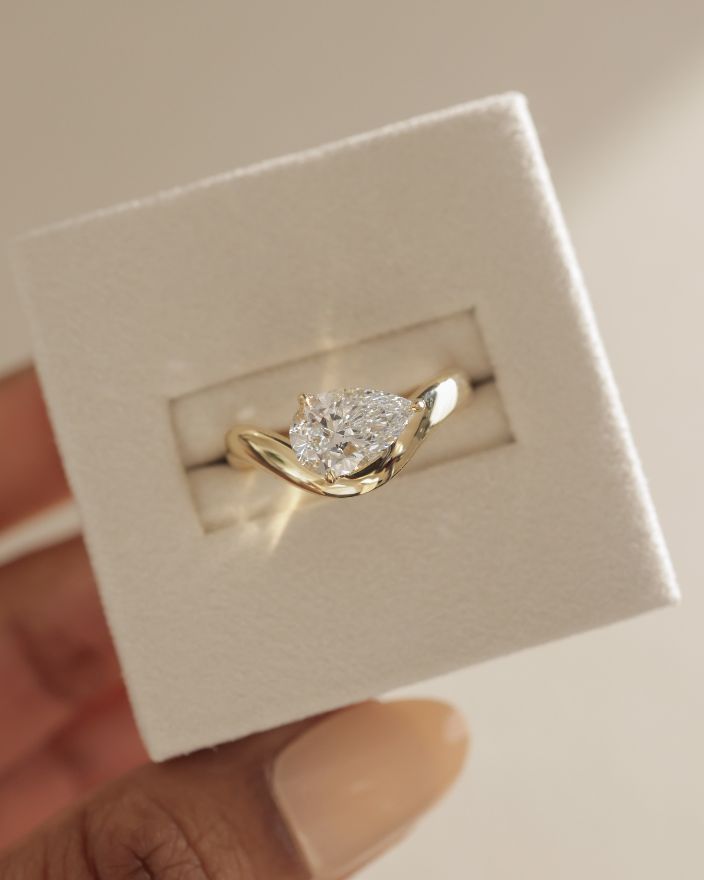 Shai - Pear Solitaire with Twist Band Lifestyle Image