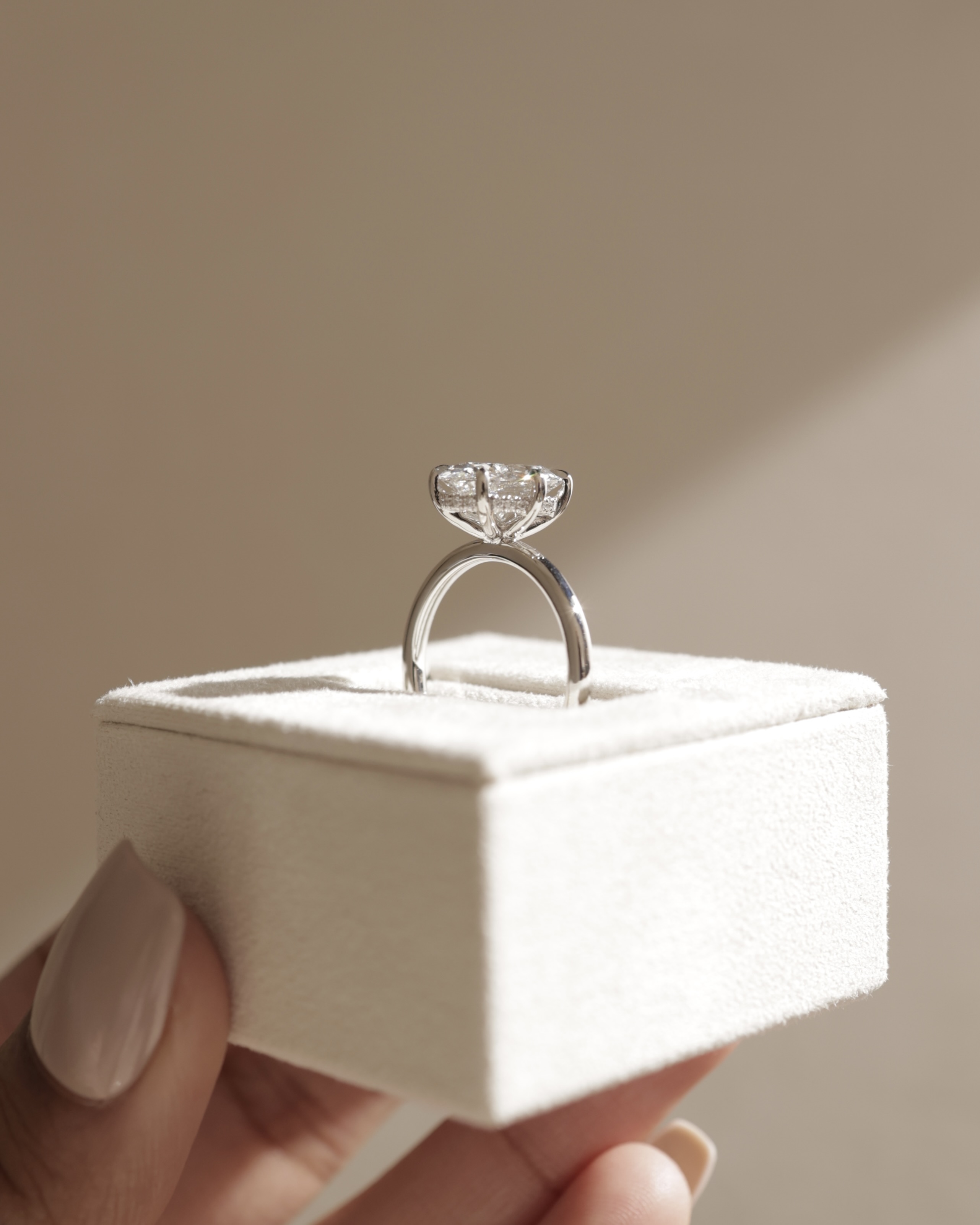 Wilma - Six Claw Oval Solitaire Lifestyle Image