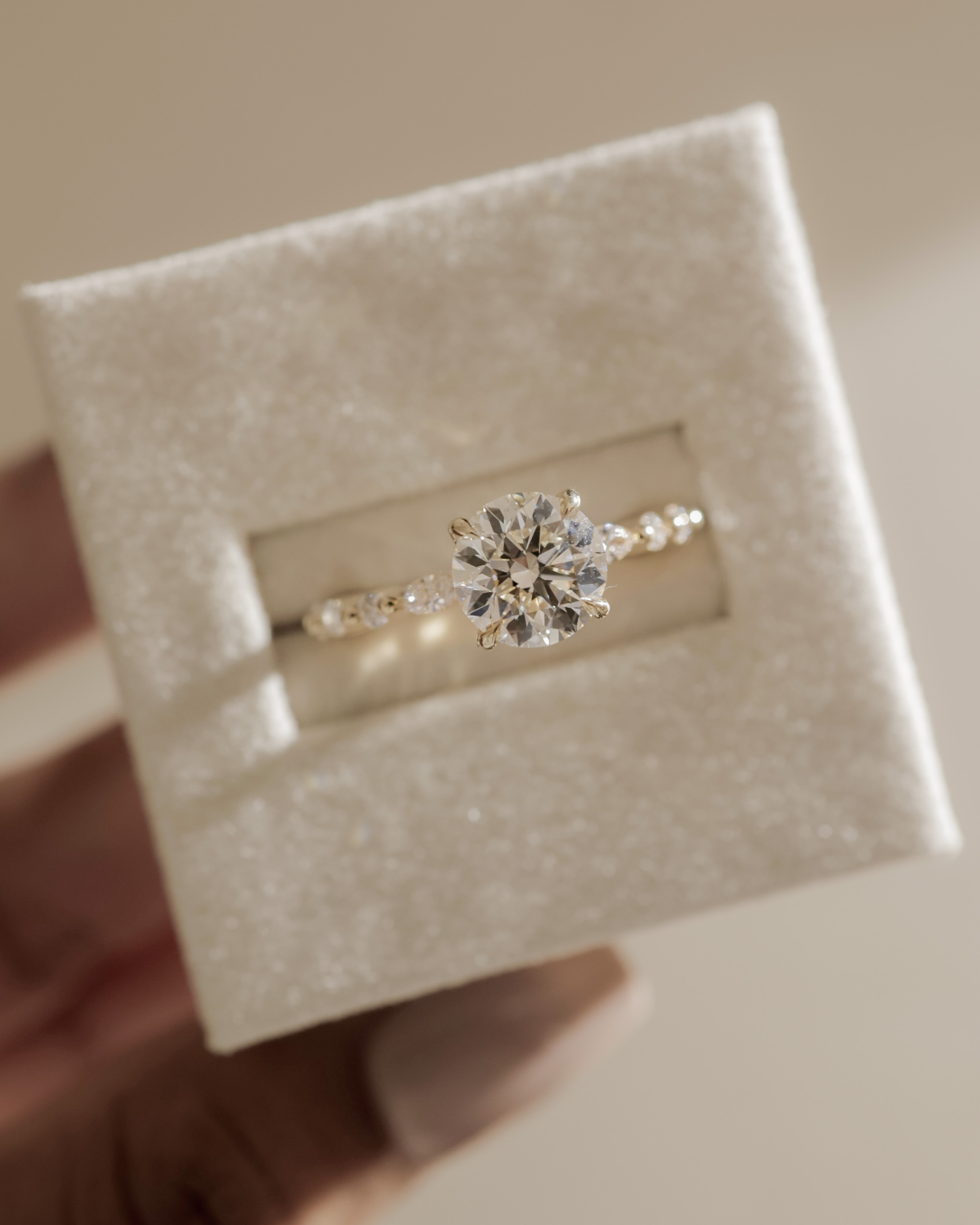 Zade - Round Solitaire with Accent Band Lifestyle Image