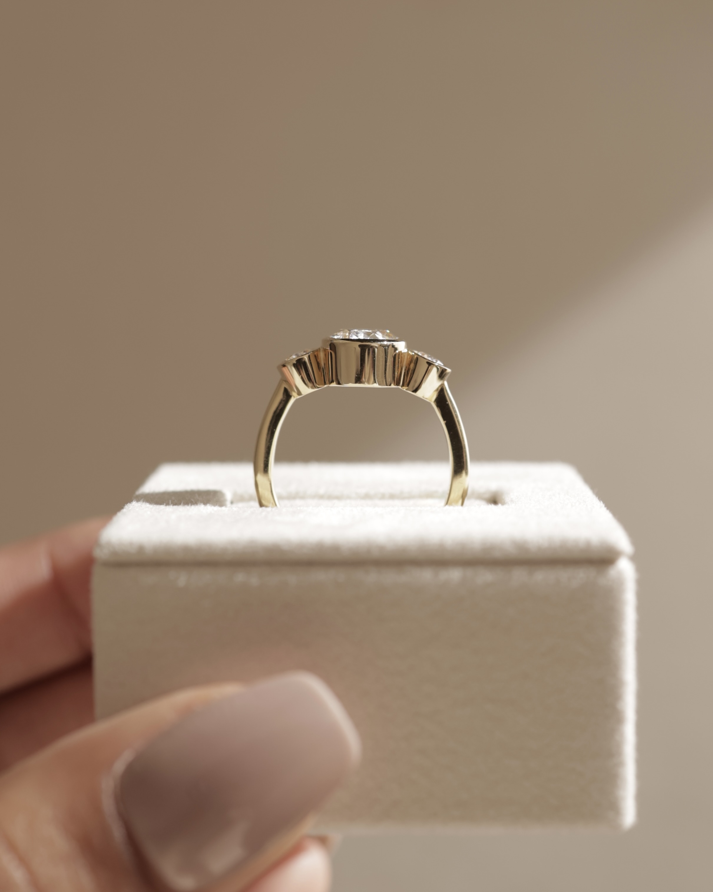 Zelda - Bezel Set Oval Trilogy Lifestyle Image