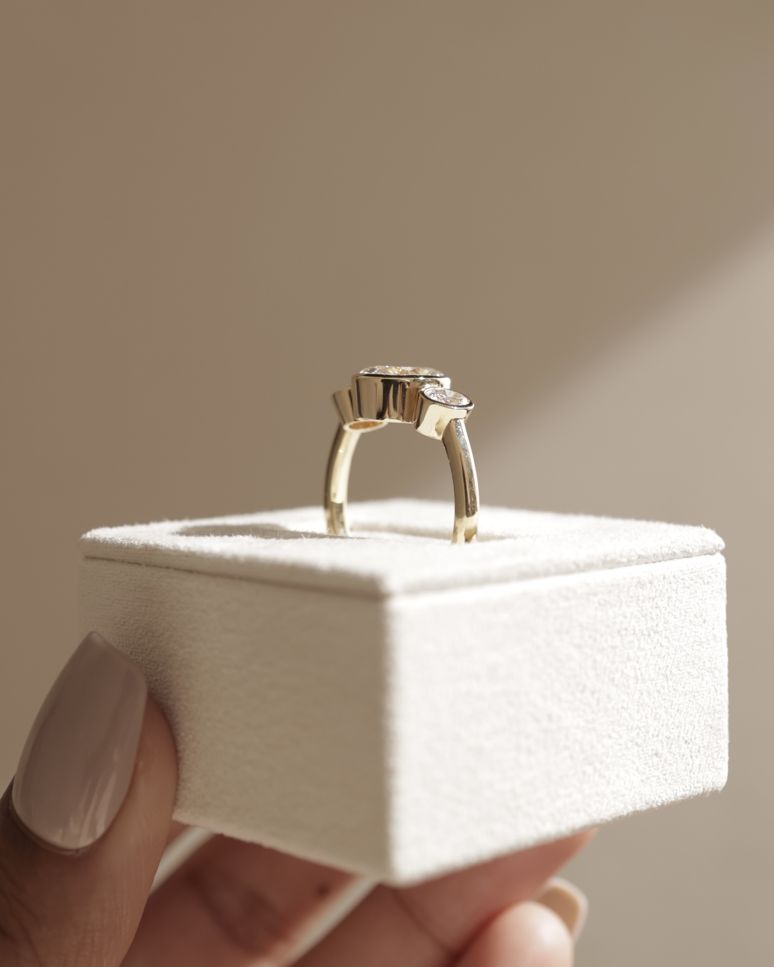 Zelda - Bezel Set Oval Trilogy Lifestyle Image