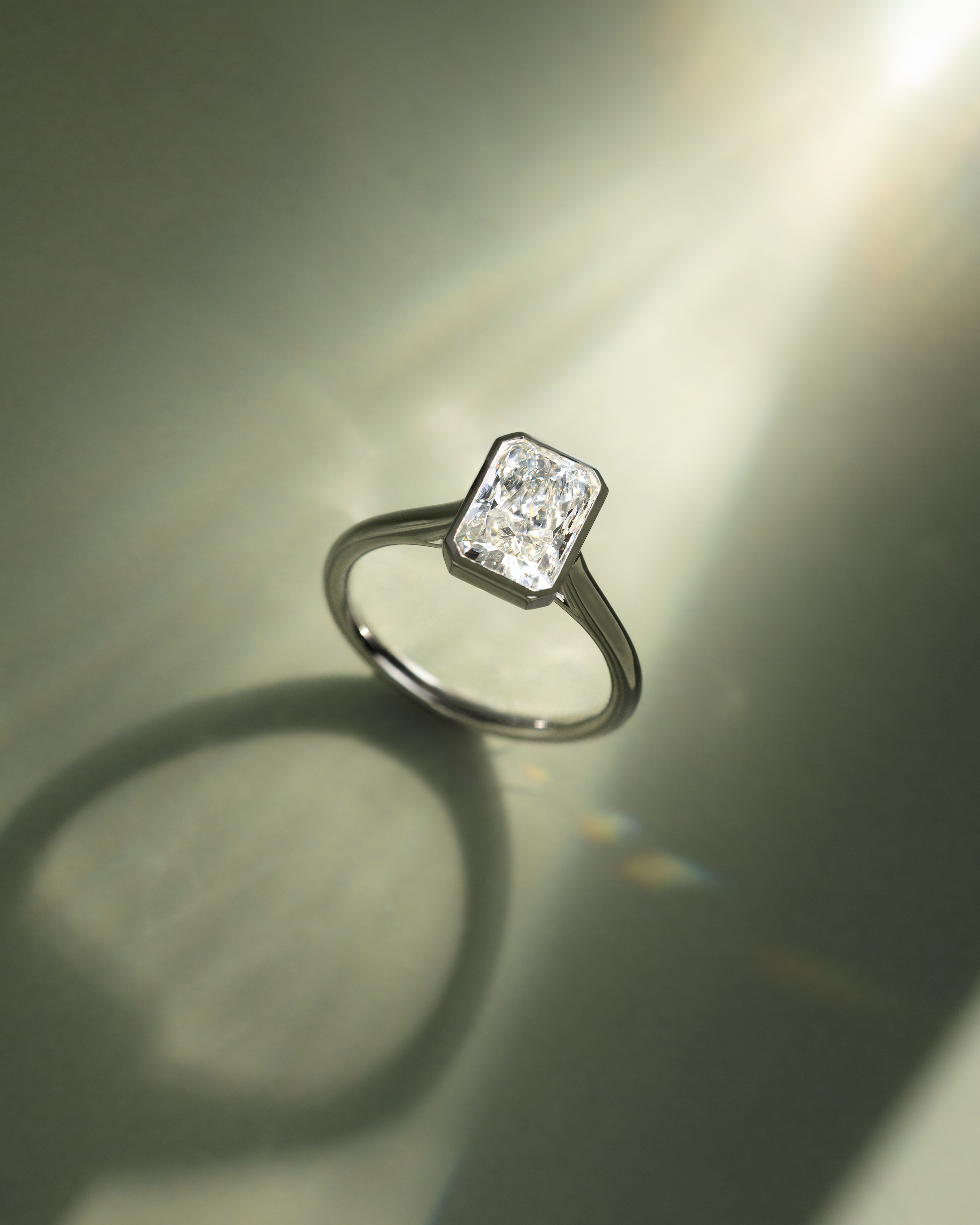 Zoe - Bezel Radiant Cathedral Solitaire Lifestyle Image